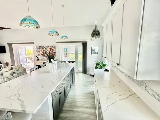 a view of balcony with furniture