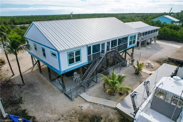 an outdoor space with furniture and garden