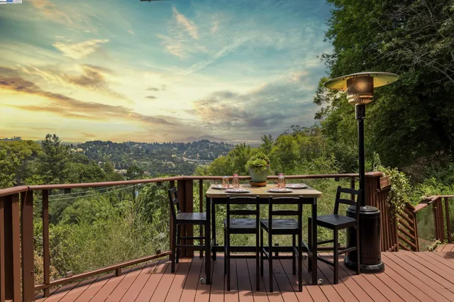 a view of a balcony with furniture