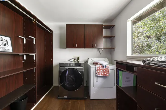 a kitchen with a stove and a refrigerator