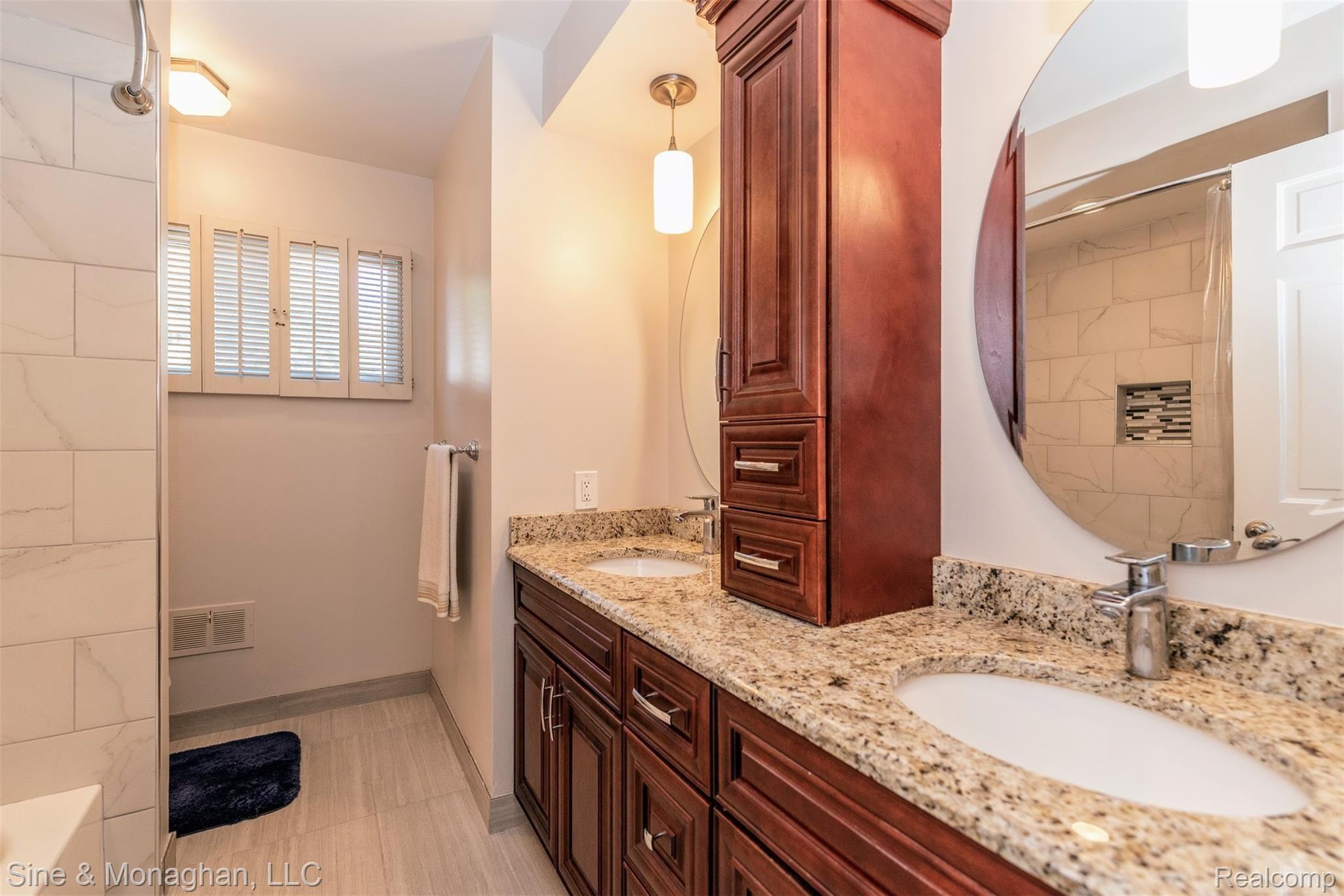 630 Overbrook Road Bloomfield Hills, MI 48302 - Photo 30 of 36 Upper Hall Bathroom with Dual Sinks.