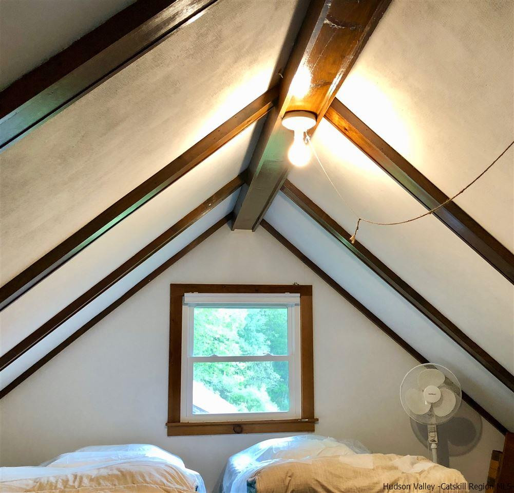 1265 Schuman Road Roxbury, NY 12474 - Photo 11 of 12 a bedroom with a bed and a window