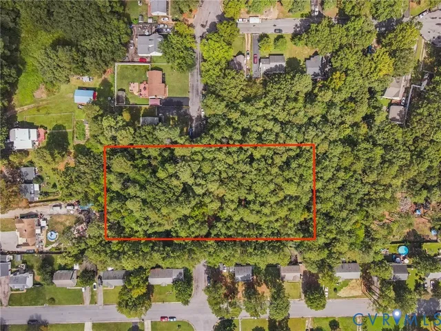 a view of a yard with an outdoor space