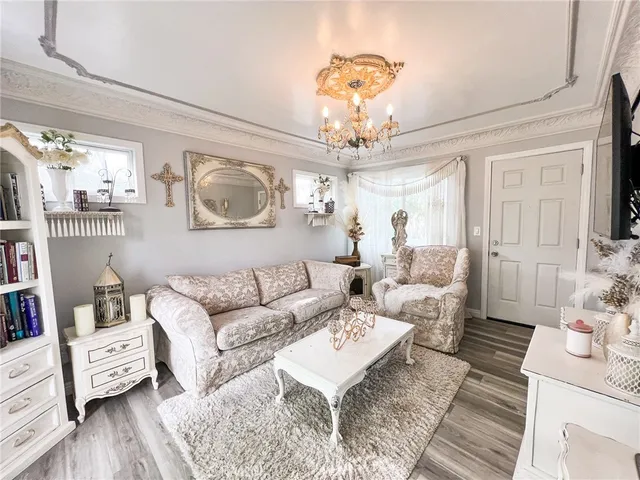 a view of a swimming pool with outdoor seating