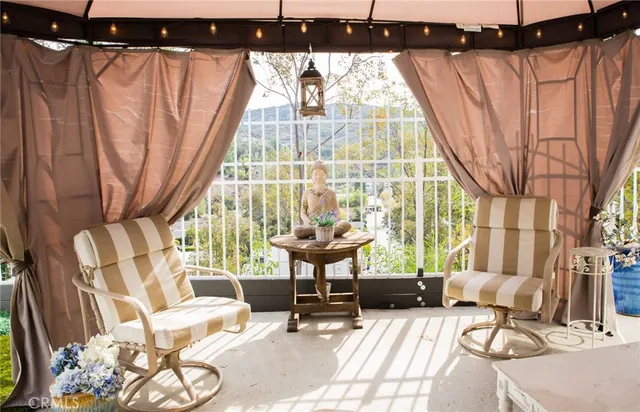 a view of a room with lots of gym equipment