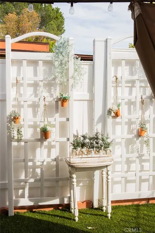 a view of a swimming pool with a yard