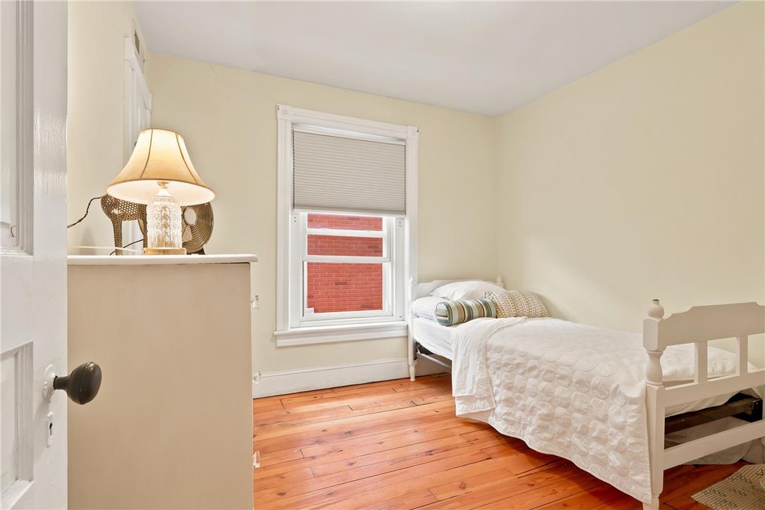 803 Spring Street Bethlehem, PA 18018 - Photo 20 of 34 A quiet retreat, this bedroom offers polished hardwood flooring and a naturally illuminated window.