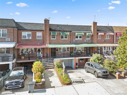 a view of a building with sitting area