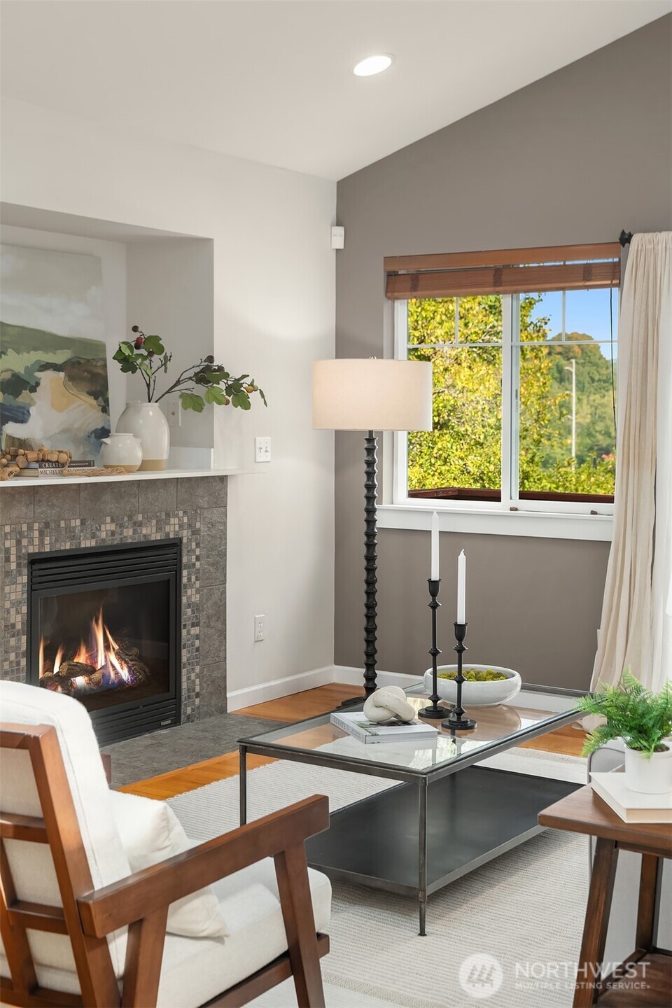 2452 Southwest Webster Street Seattle, WA 98106 - Photo 15 of 28 a living room with furniture and a fireplace