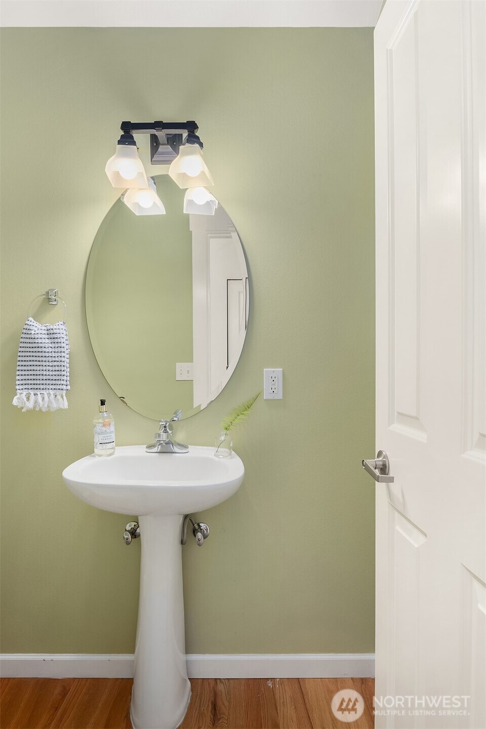 2452 Southwest Webster Street Seattle, WA 98106 - Photo 16 of 28 a bathroom with a sink toilet and a mirror