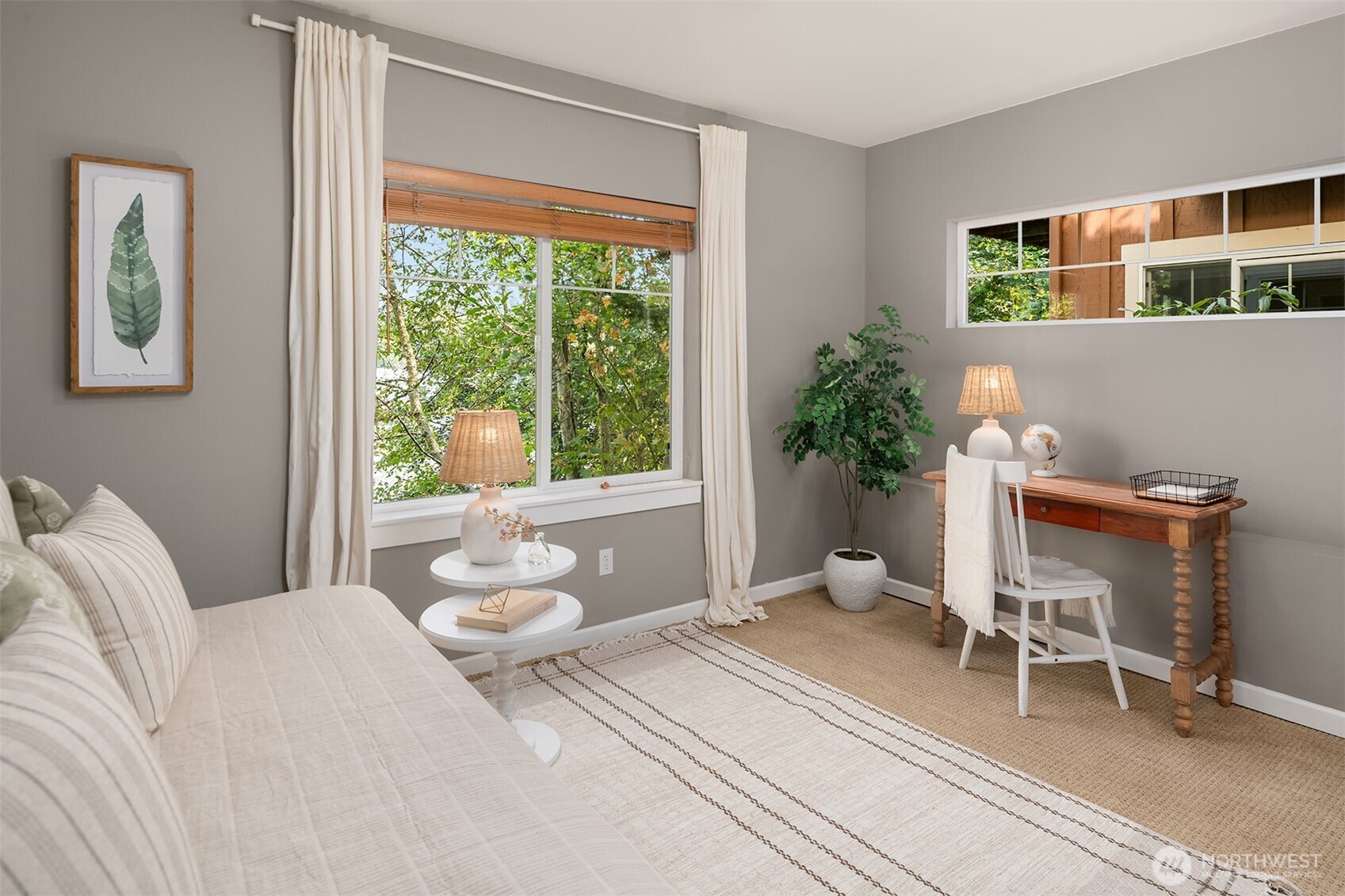 2452 Southwest Webster Street Seattle, WA 98106 - Photo 23 of 28 a bedroom with a bed and a large window