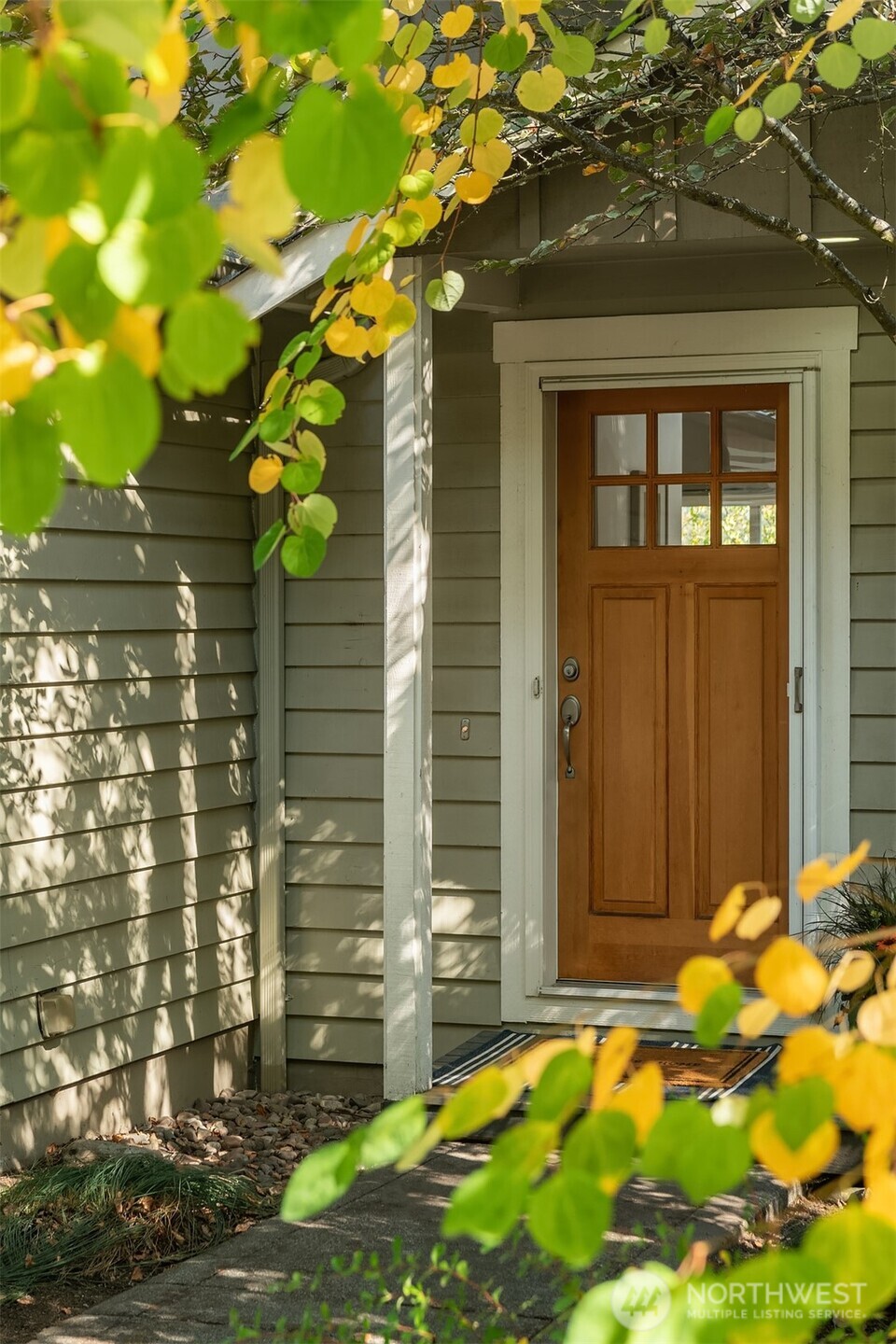 2452 Southwest Webster Street Seattle, WA 98106 - Photo 28 of 28 a flower garden is sitting in front of a house