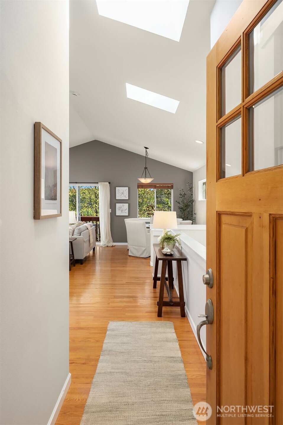 2452 Southwest Webster Street Seattle, WA 98106 - Photo 3 of 28 a living room with furniture and a table