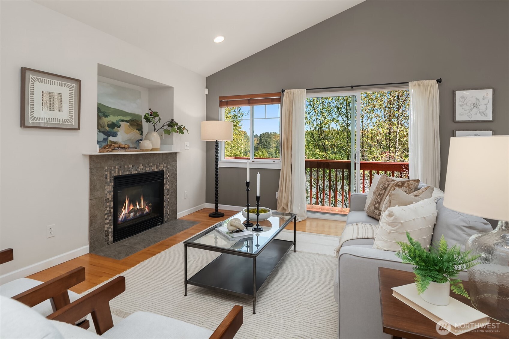 2452 Southwest Webster Street Seattle, WA 98106 - Photo 5 of 28 a living room with furniture and a fireplace
