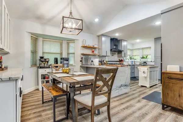 a view of a dining room with furniture