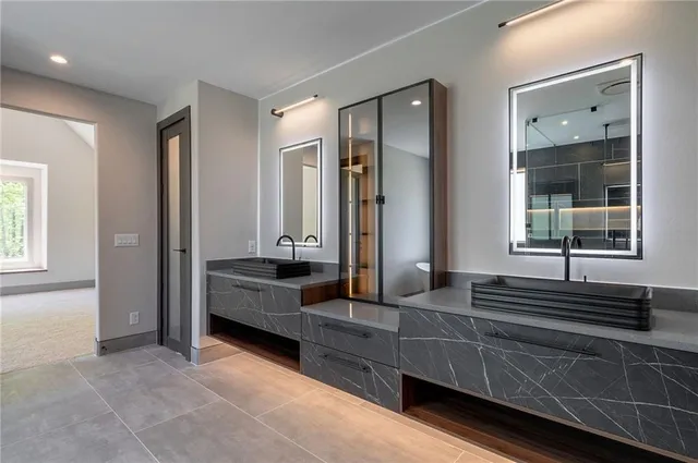 a living room with furniture and large window