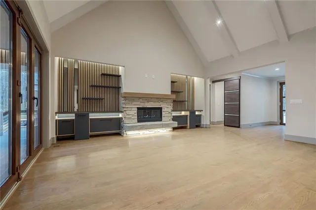 a view of a livingroom with furniture and a fireplace