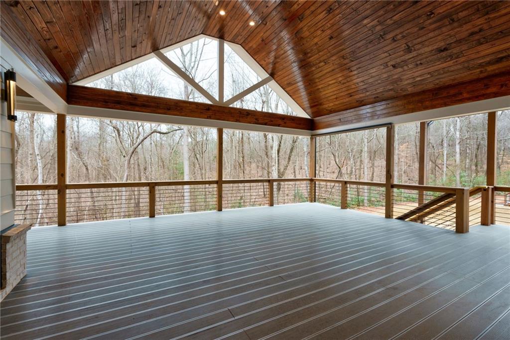 71 Ramey Road Sugar Hill, GA 30518 - Photo 24 of 58 a view of empty room with wooden floor and fan