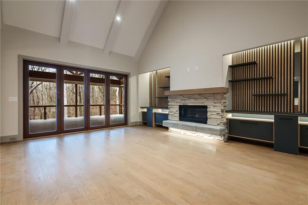 71 Ramey Road Sugar Hill, GA 30518 - Photo 26 of 58 a view of a livingroom with furniture and a fireplace