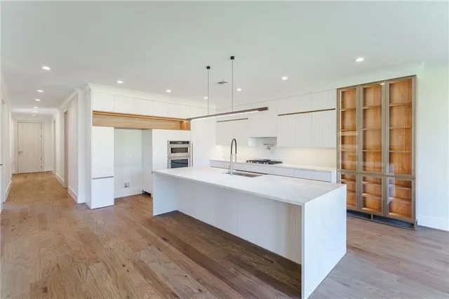 a bathroom with a sink and a window