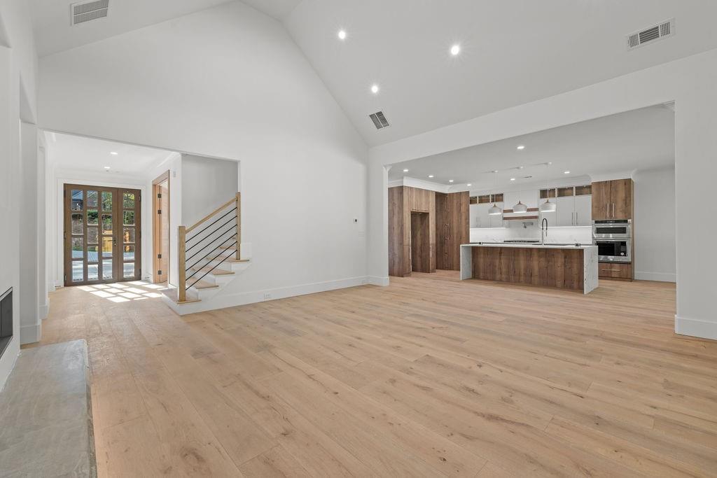71 Ramey Road Sugar Hill, GA 30518 - Photo 47 of 58 a view of a kitchen with a stove cabinets and wooden floor