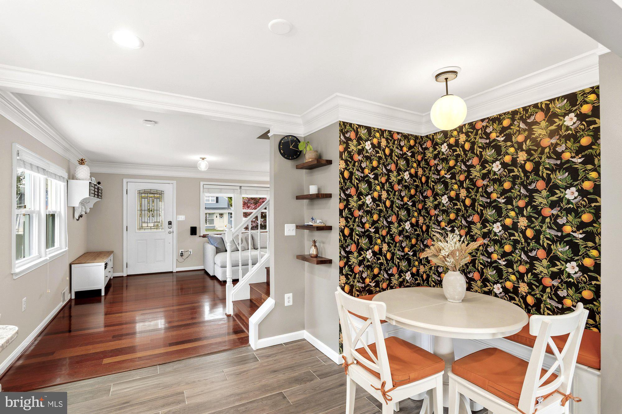 6809 Duke Drive Alexandria, VA 22307 - Photo 13 of 30 a living room with a black white checkered floor with couches and a dining table with wooden floor