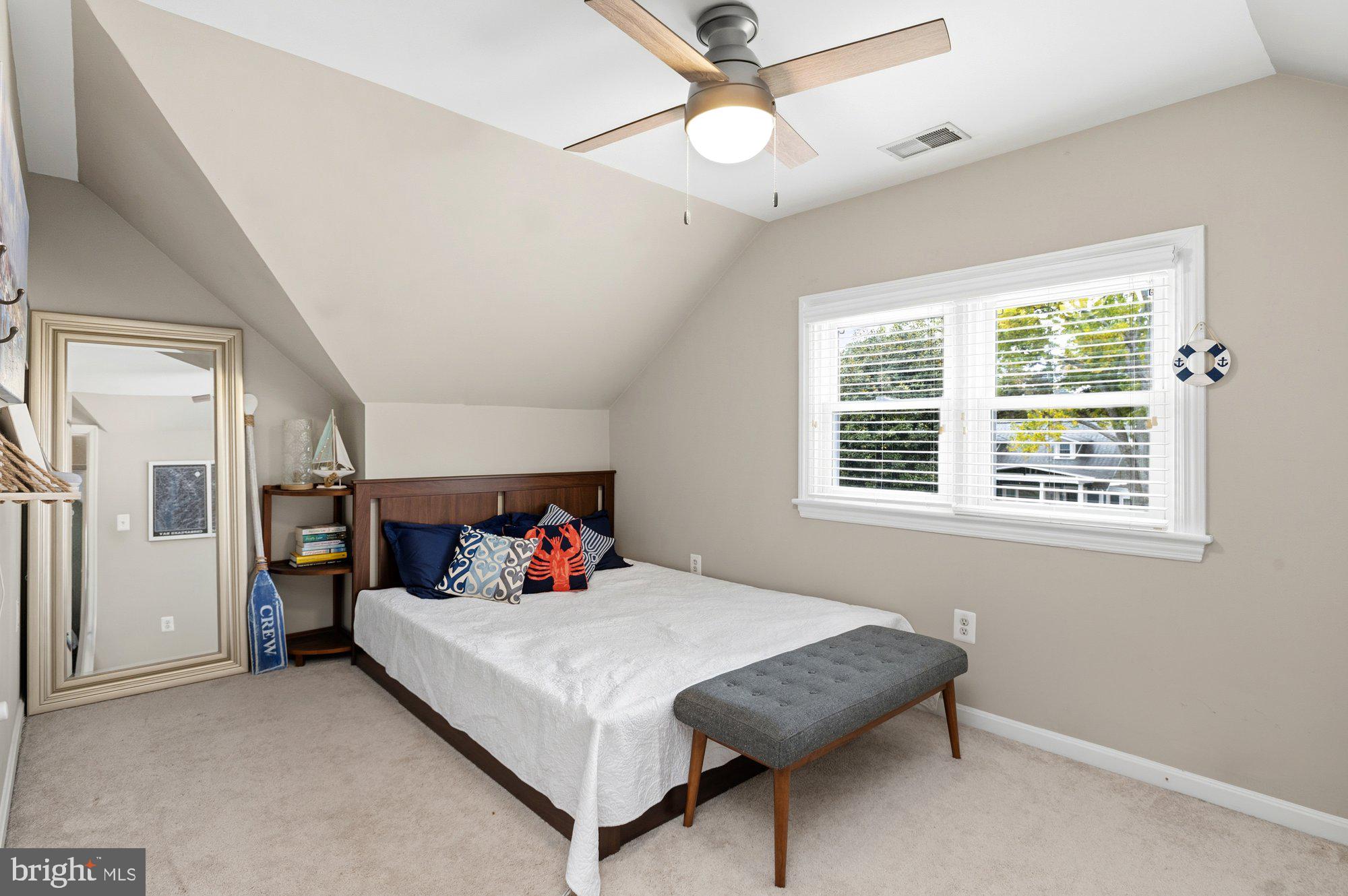 6809 Duke Drive Alexandria, VA 22307 - Photo 19 of 30 a bedroom with a bed and a window