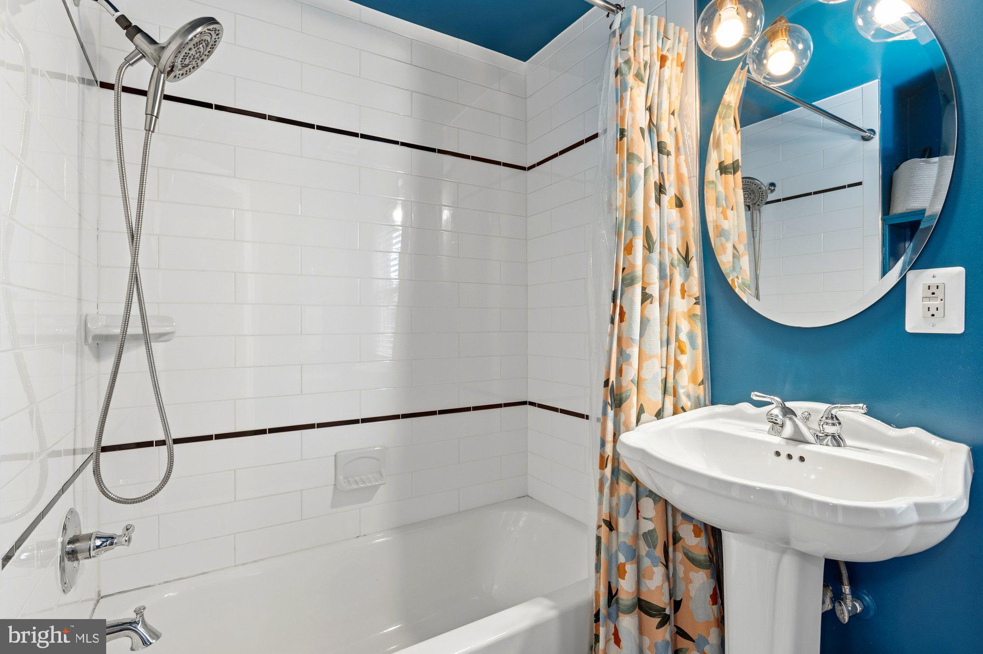 6809 Duke Drive Alexandria, VA 22307 - Photo 20 of 30 a bathroom with a sink and a mirror