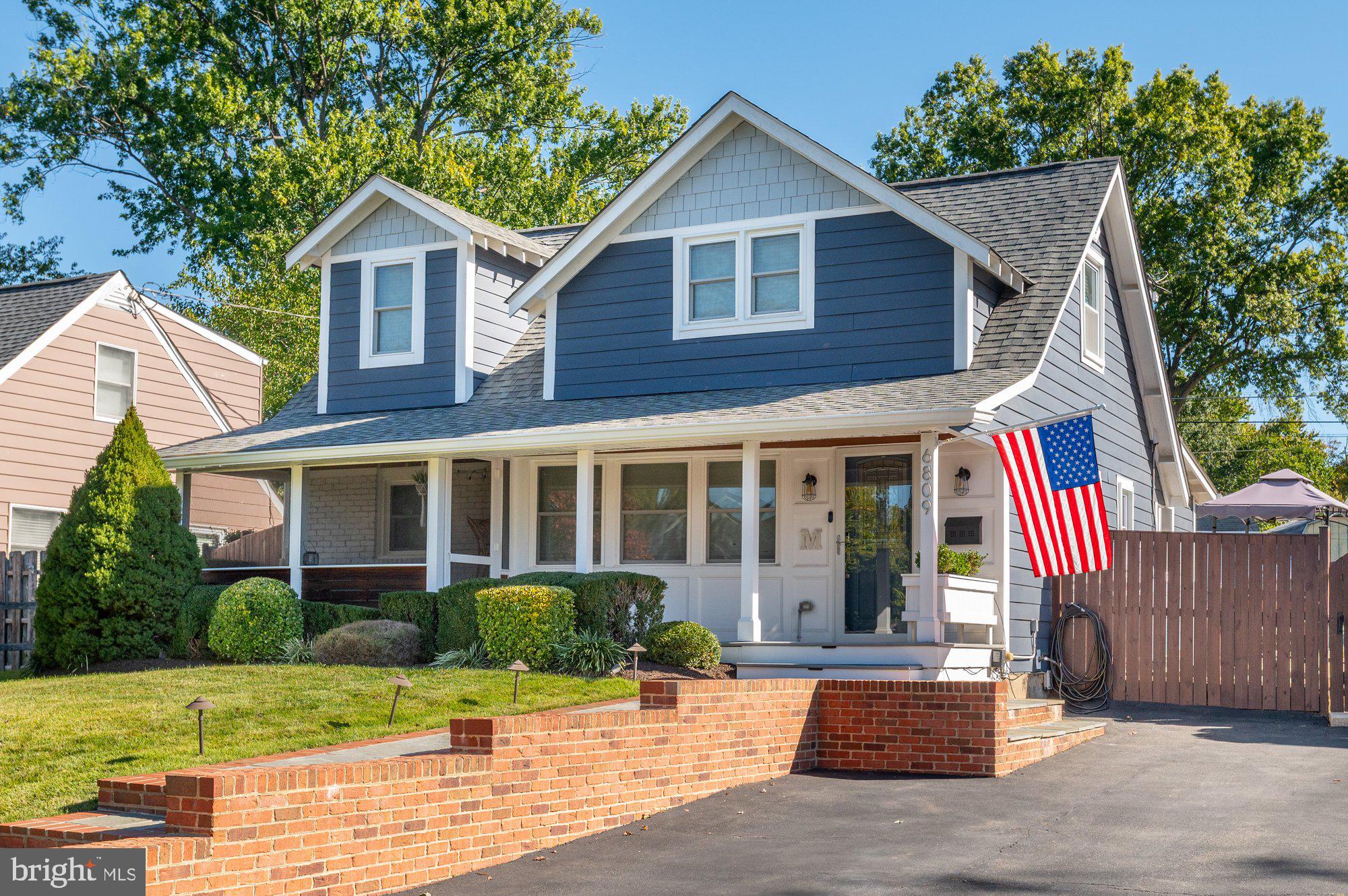 6809 Duke Drive Alexandria, VA 22307 - Photo 2 of 30 a view of a house with a yard