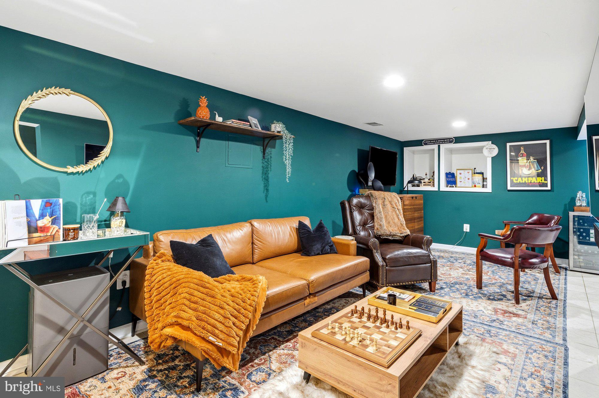 6809 Duke Drive Alexandria, VA 22307 - Photo 22 of 30 a living room with furniture and a wooden floor
