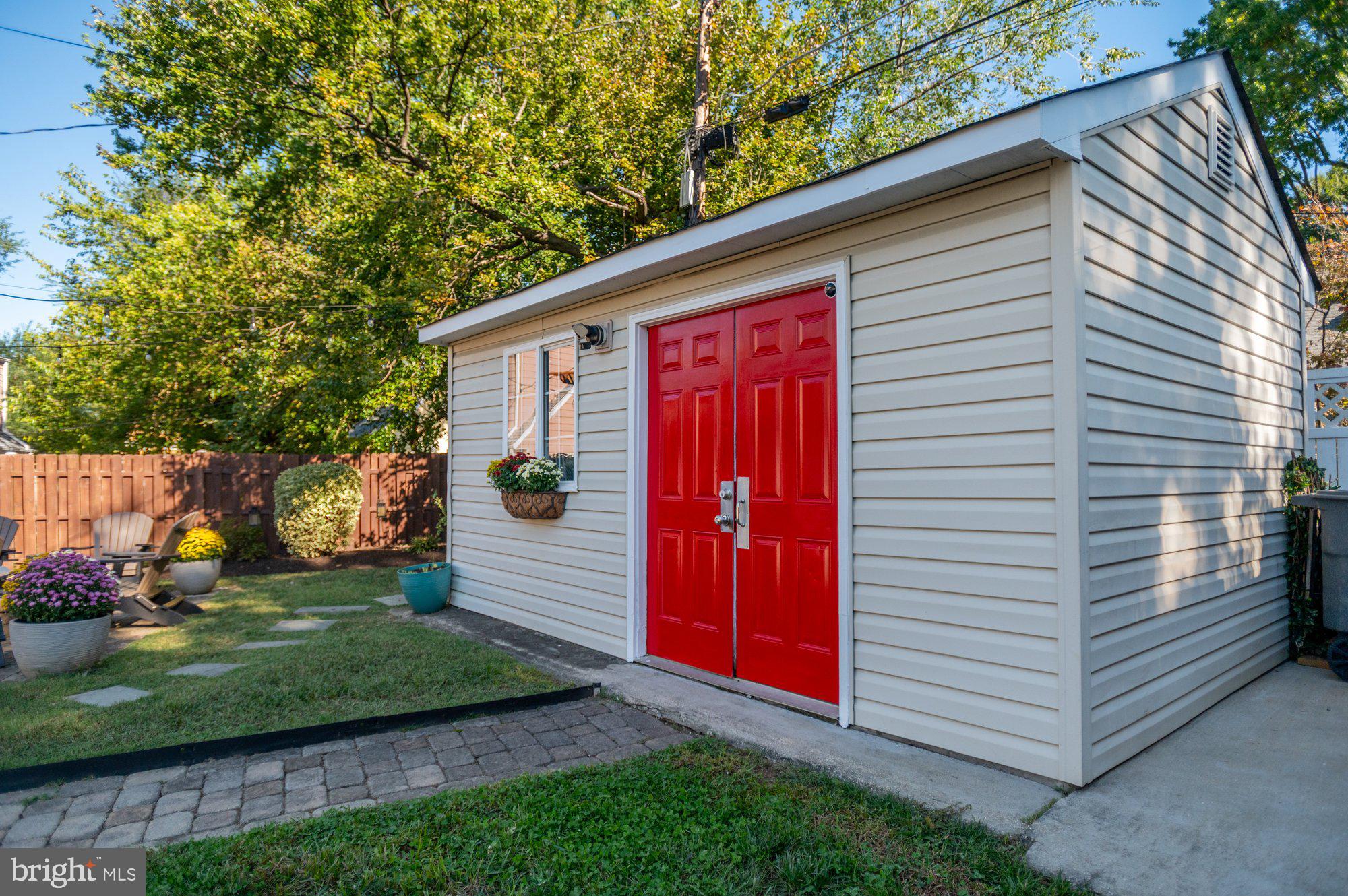 6809 Duke Drive Alexandria, VA 22307 - Photo 29 of 30 a front view of a house with garden
