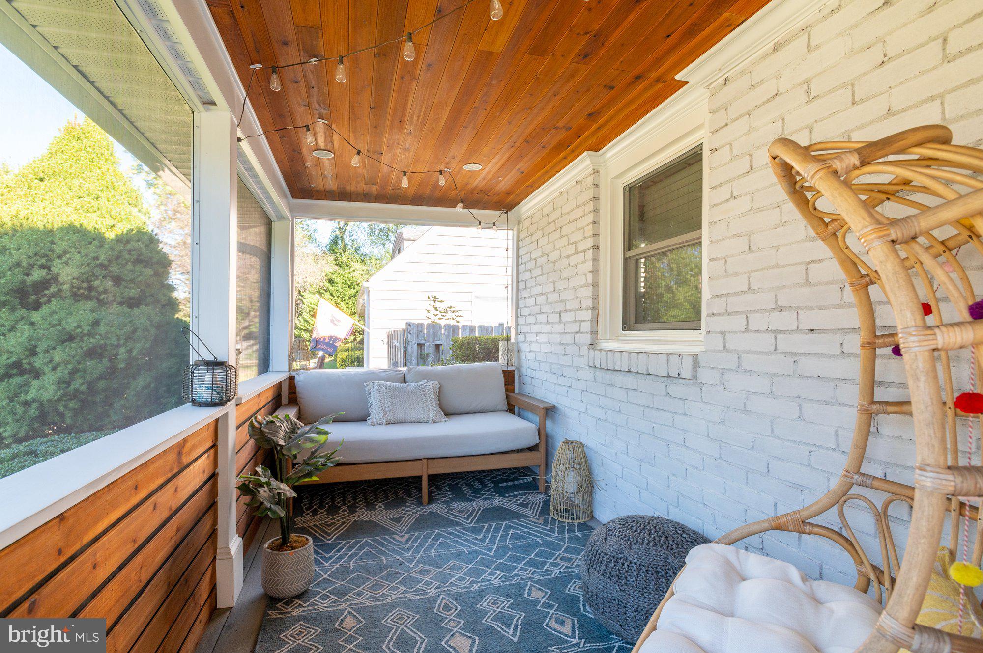 6809 Duke Drive Alexandria, VA 22307 - Photo 4 of 30 a outdoor living space with patio furniture