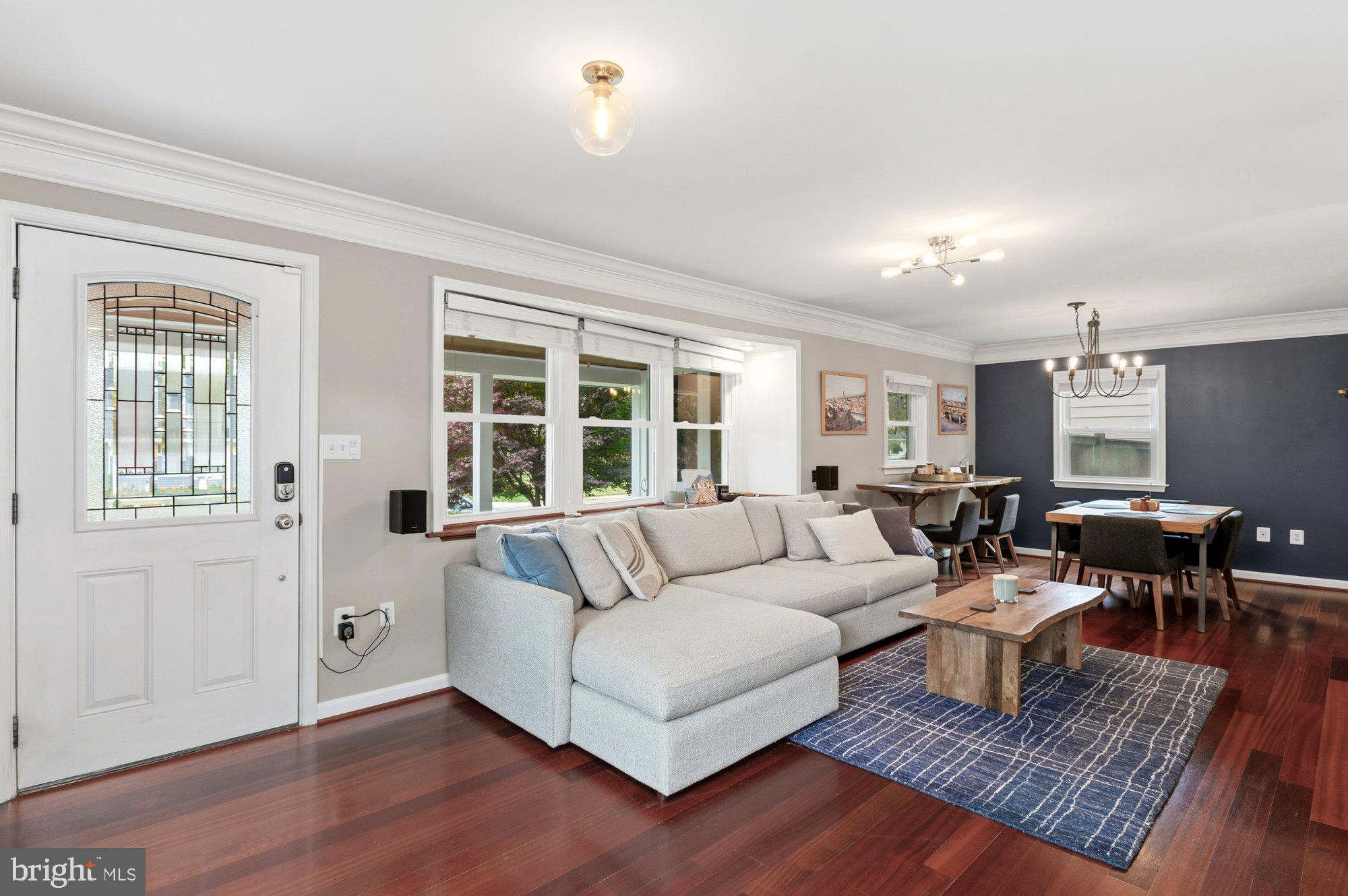 6809 Duke Drive Alexandria, VA 22307 - Photo 8 of 30 a living room with furniture wooden floor and a large window