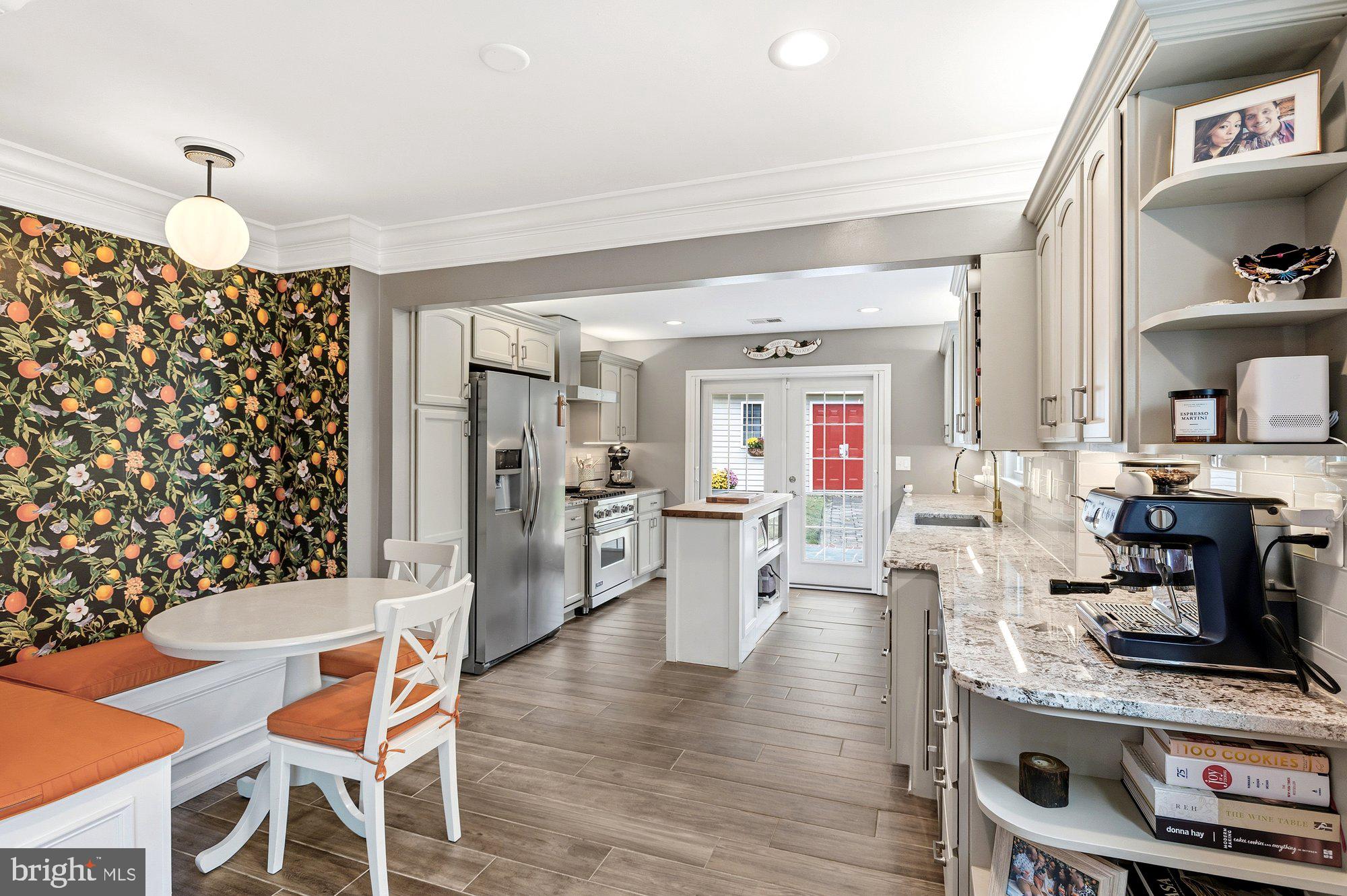 6809 Duke Drive Alexandria, VA 22307 - Photo 10 of 30 a living room with furniture a table and chairs