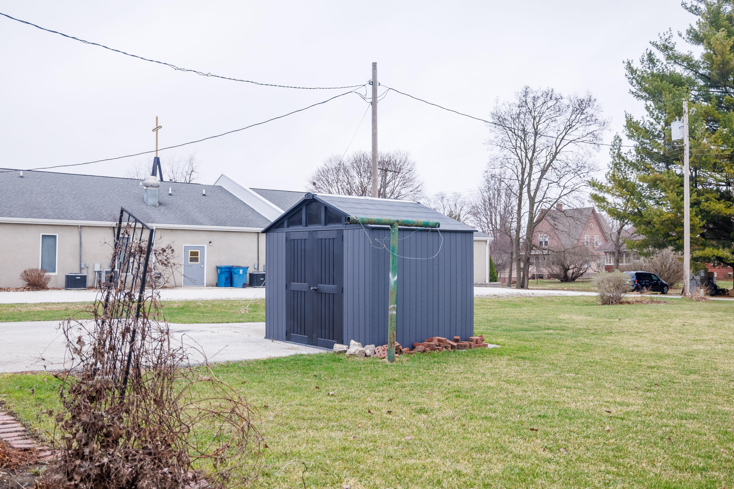 128 East Main Street Brook, IN 47922 - Photo 18 of 68 a view of a house with a yard
