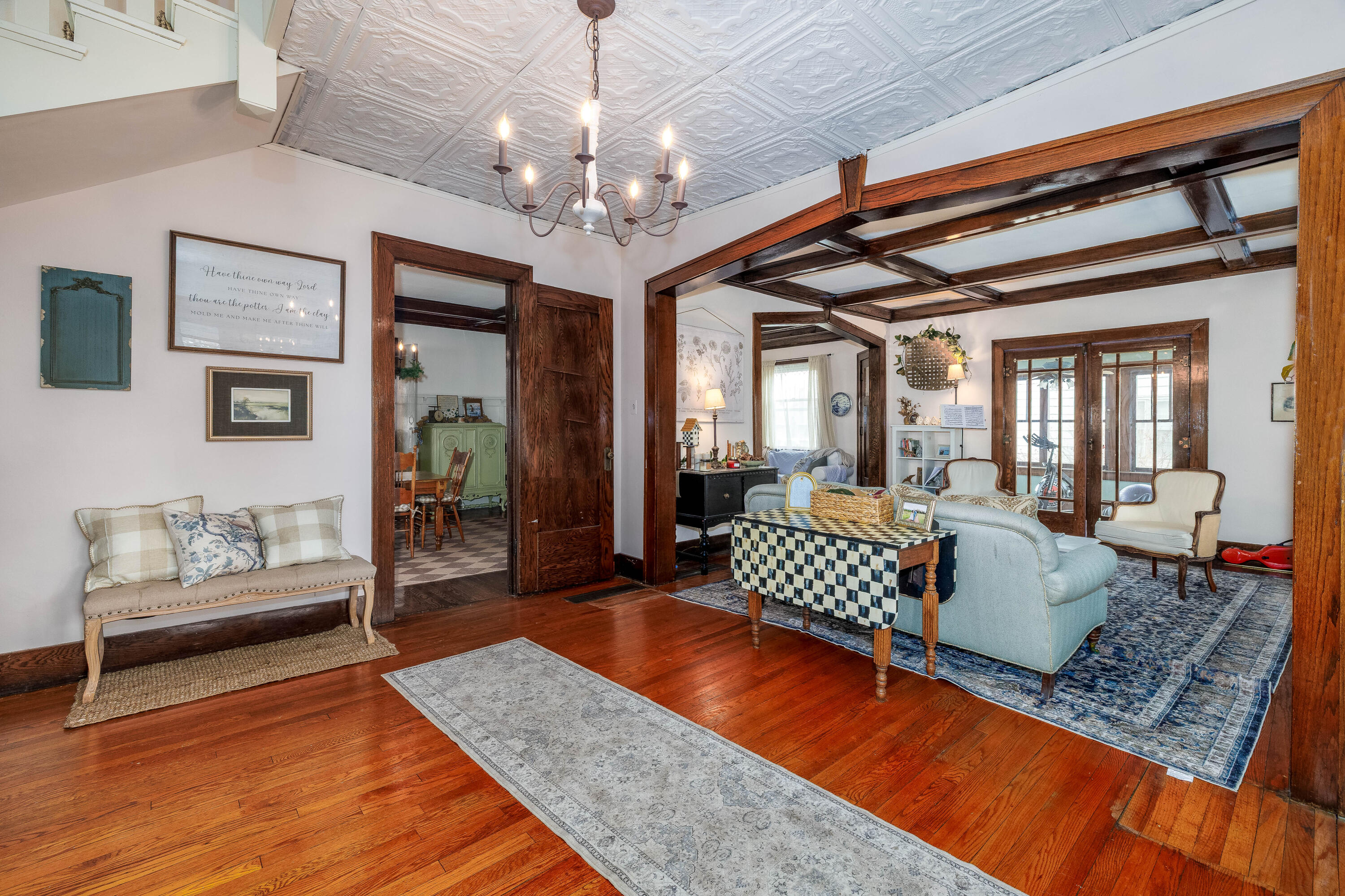 128 East Main Street Brook, IN 47922 - Photo 24 of 68 a living room with furniture and a chandelier