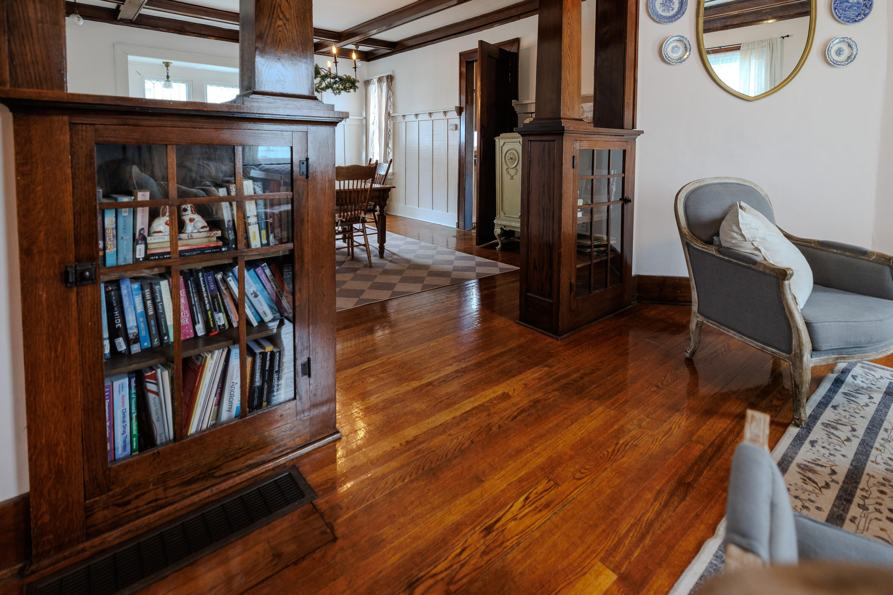 128 East Main Street Brook, IN 47922 - Photo 34 of 68 a view of a livingroom with furniture wooden floor book shelf and a fireplace