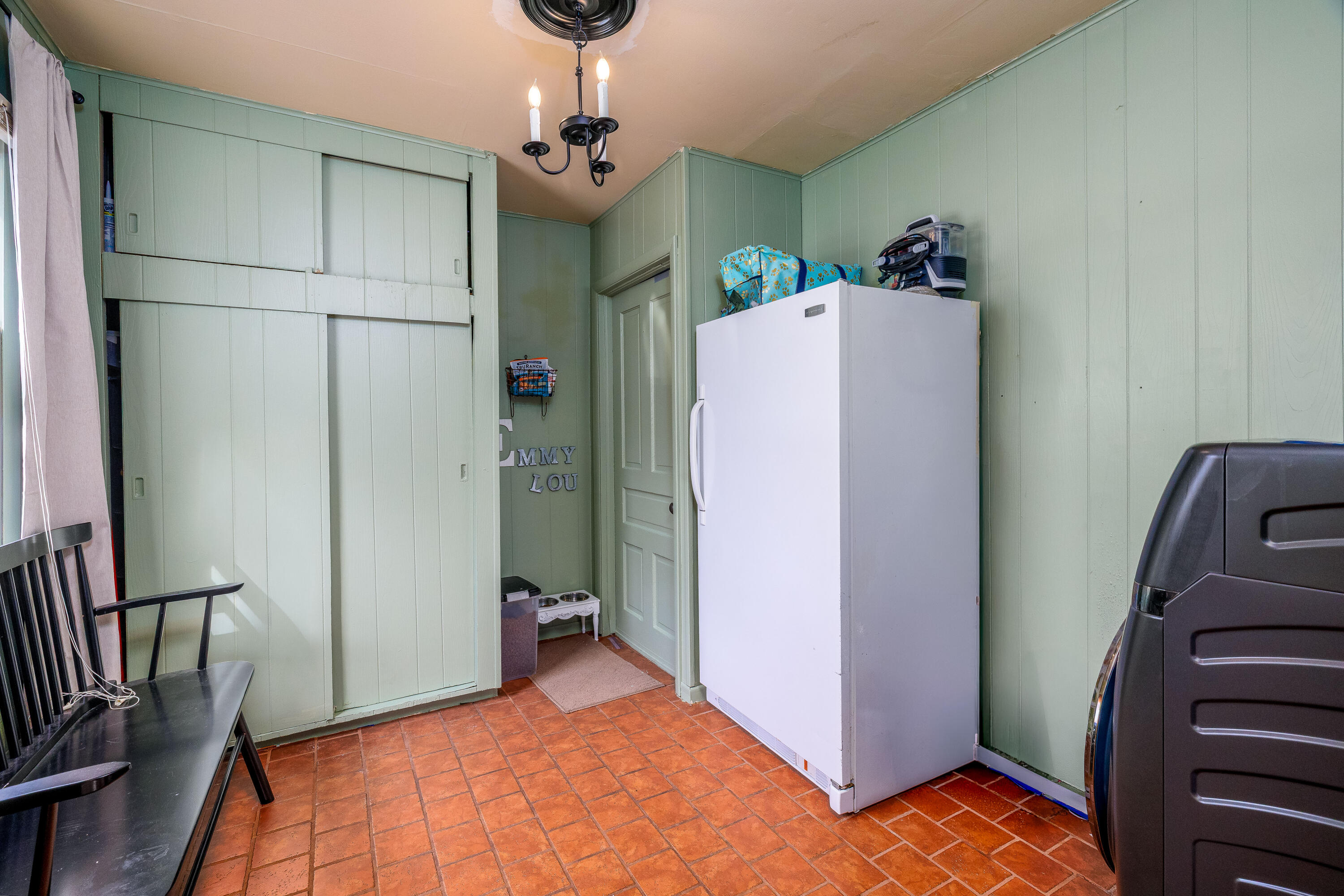 128 East Main Street Brook, IN 47922 - Photo 44 of 68 a view of a storage & utility room with closet wooden floor