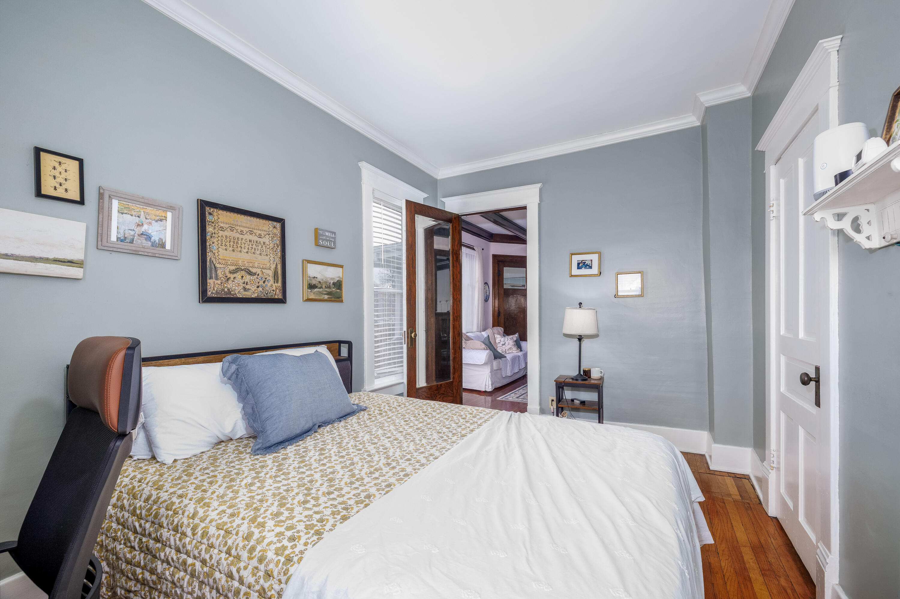 128 East Main Street Brook, IN 47922 - Photo 46 of 68 a bedroom with bed and wooden floor