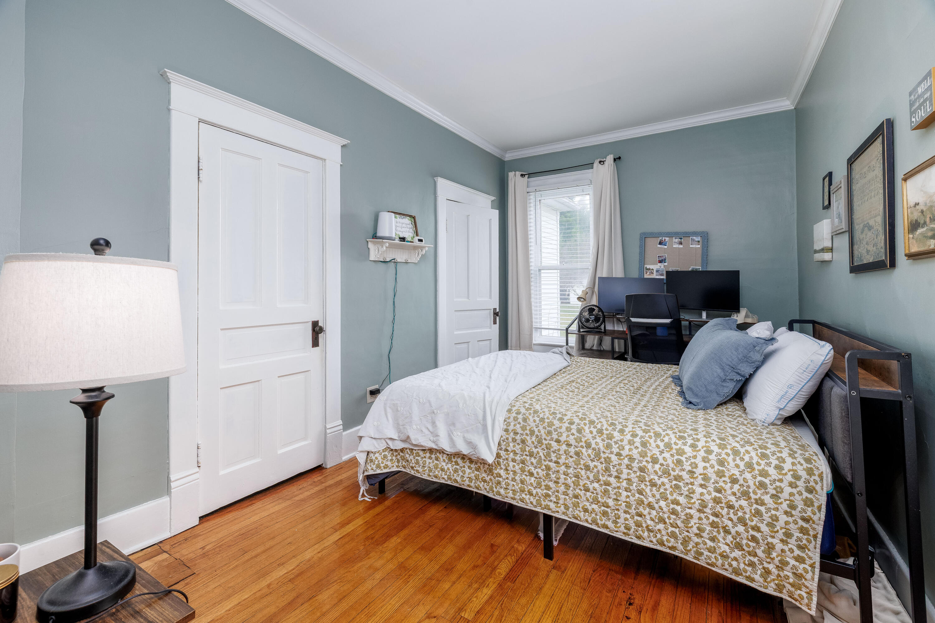 128 East Main Street Brook, IN 47922 - Photo 47 of 68 a bedroom with a bed and wooden floor