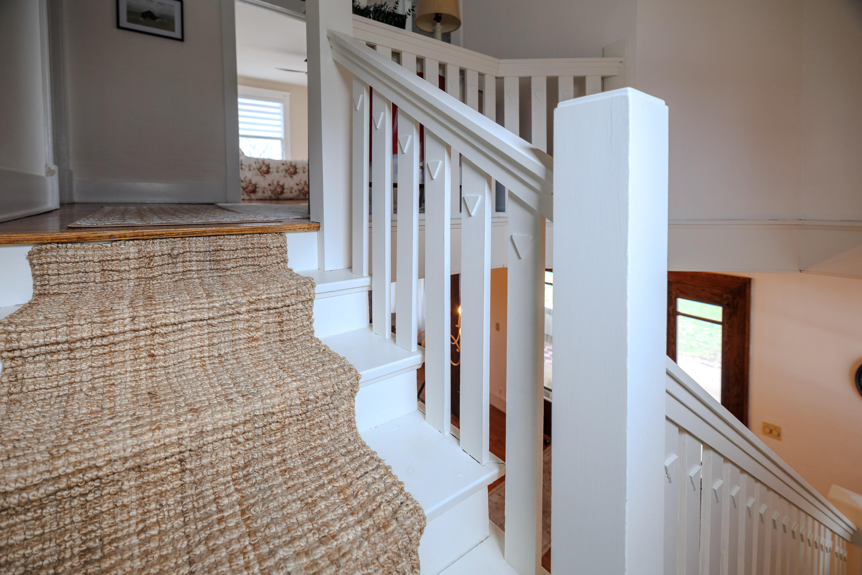 128 East Main Street Brook, IN 47922 - Photo 50 of 68 a view of staircase with white walls and windows