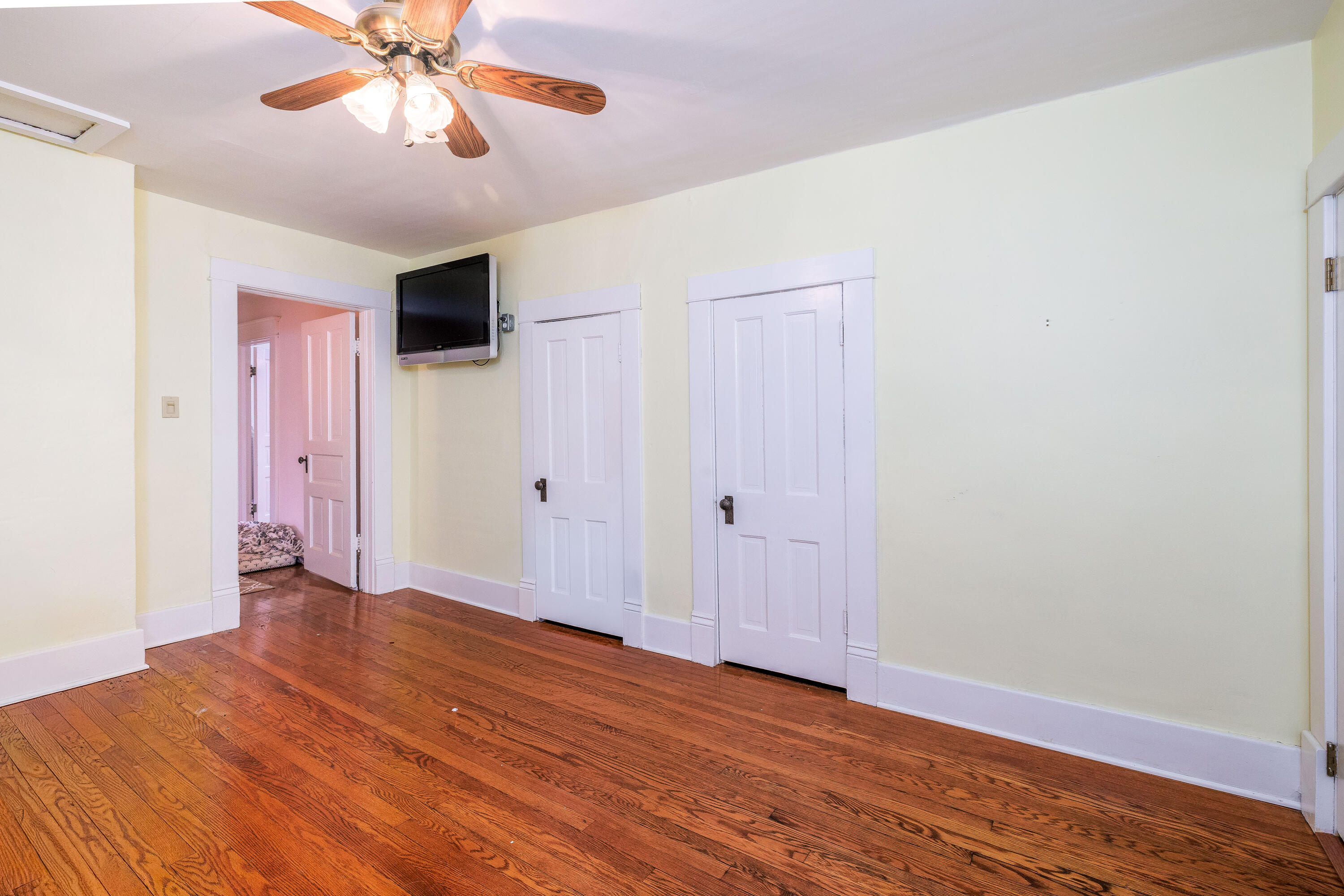 128 East Main Street Brook, IN 47922 - Photo 58 of 68 a view of empty room with wooden floor
