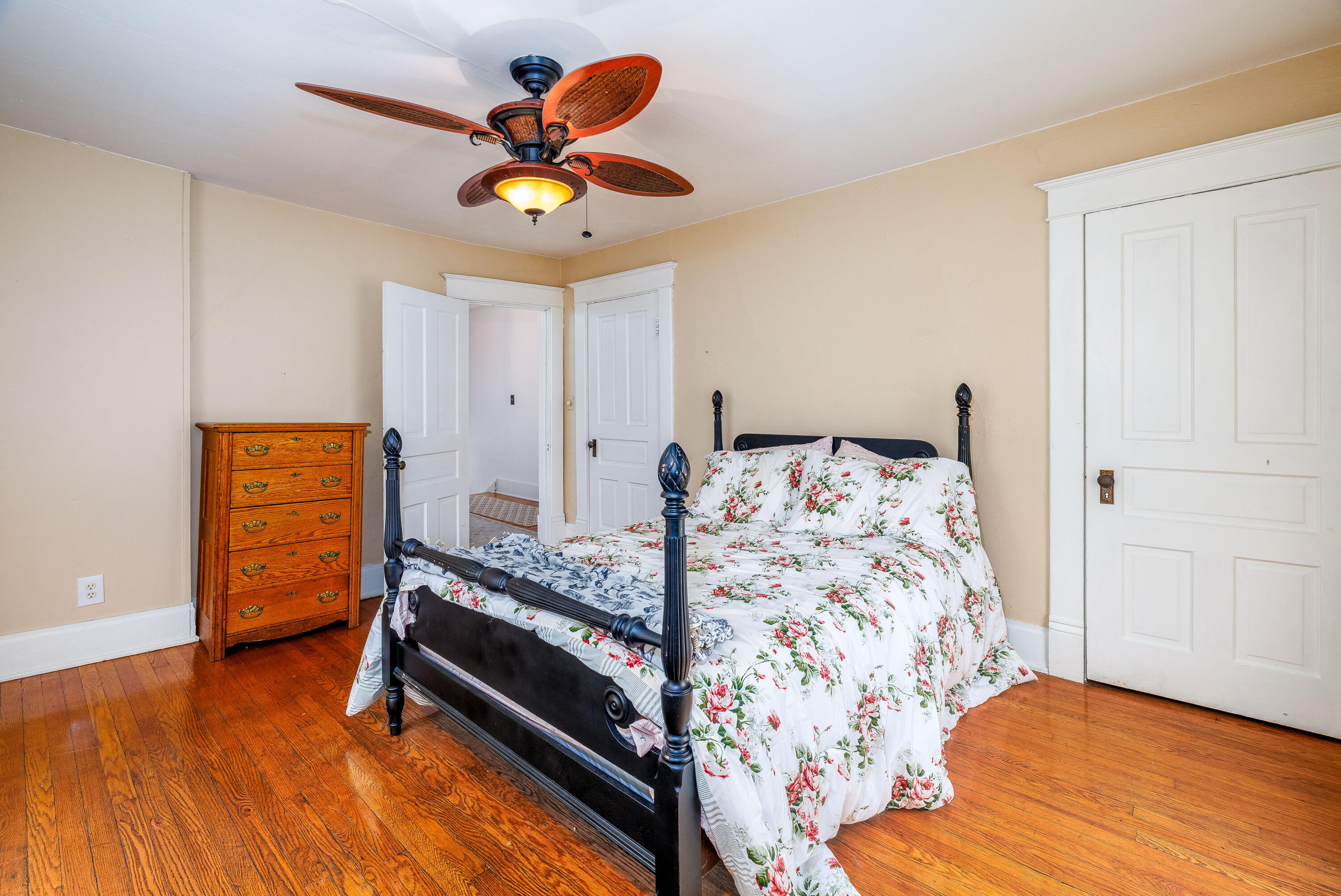 128 East Main Street Brook, IN 47922 - Photo 64 of 68 a bedroom with bed and wooden floor