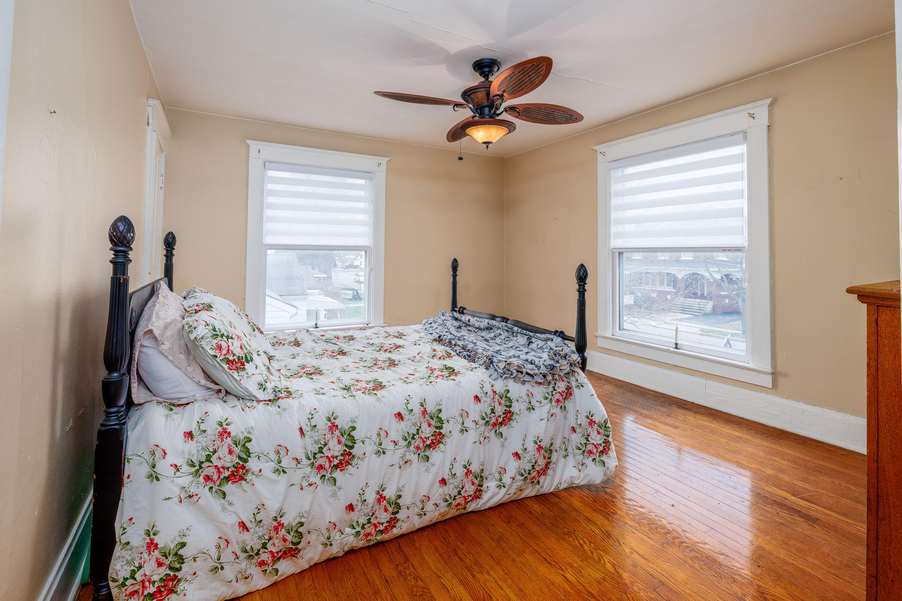 128 East Main Street Brook, IN 47922 - Photo 65 of 68 a bedroom with a large bed and a window
