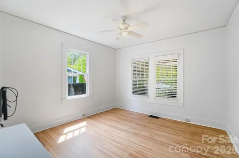 a kitchen with a sink and a refrigerator