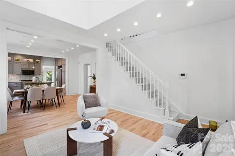 a kitchen with a table and chairs in it