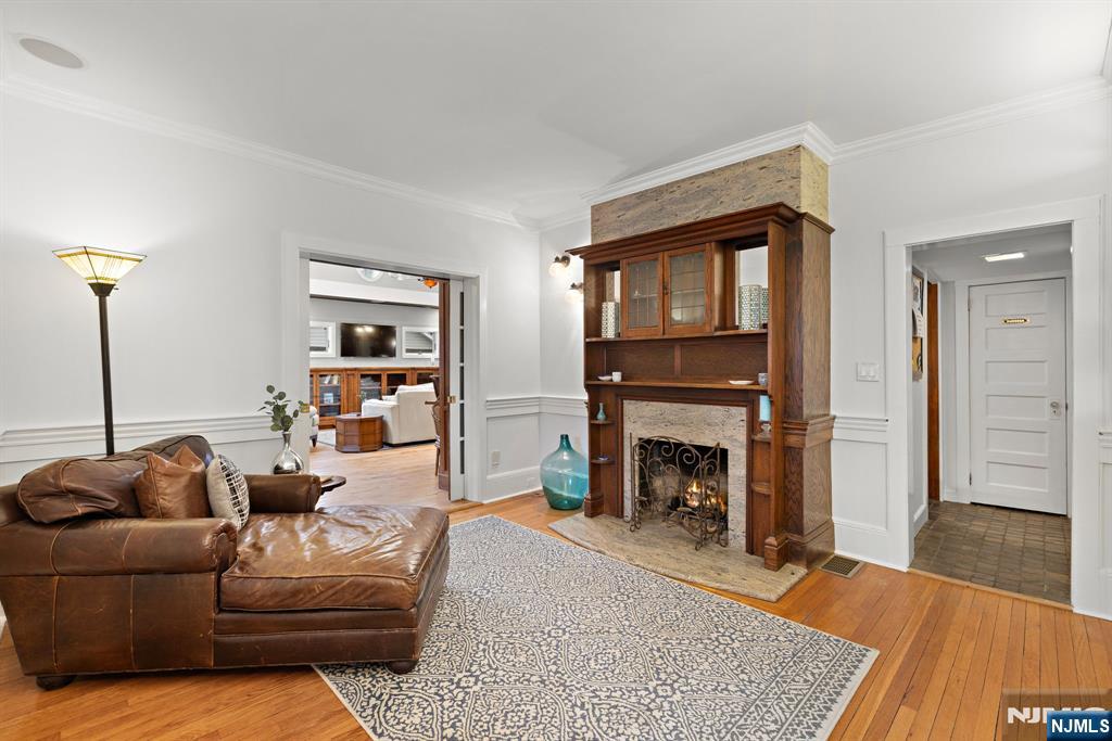12 Midwood Road Glen Rock, NJ 07452 - Photo 11 of 30 a living room with furniture and a fireplace