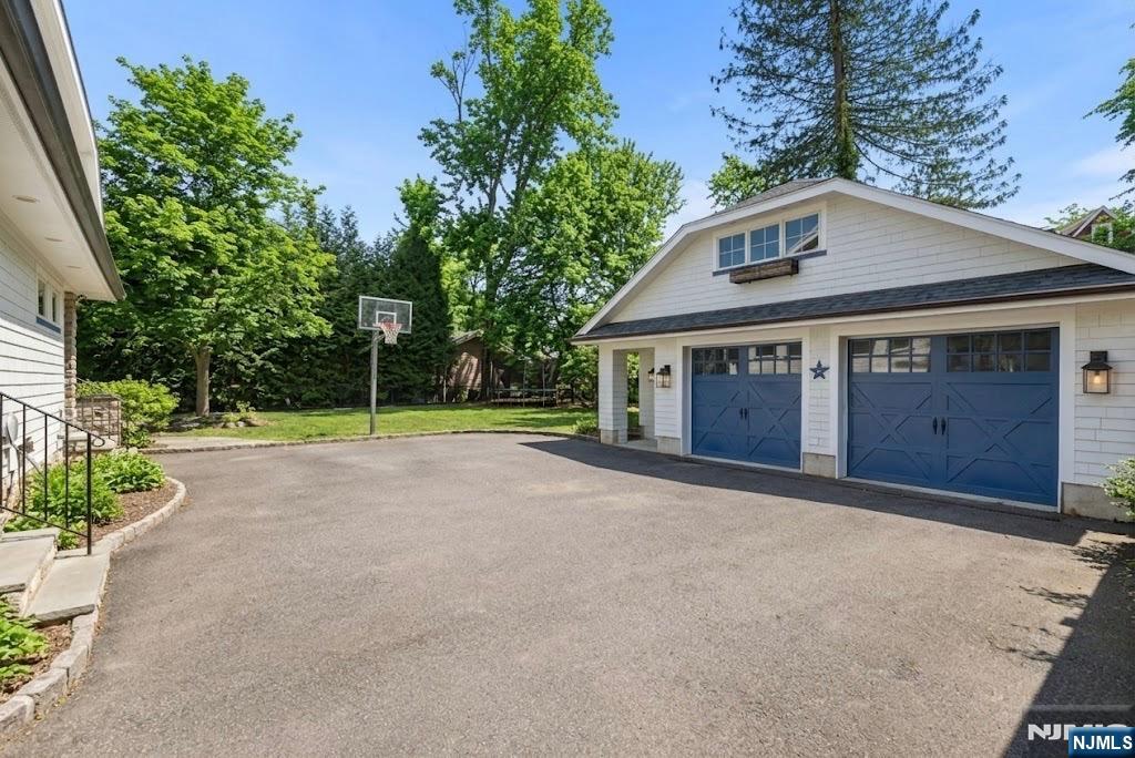 12 Midwood Road Glen Rock, NJ 07452 - Photo 28 of 30 a house with a yard