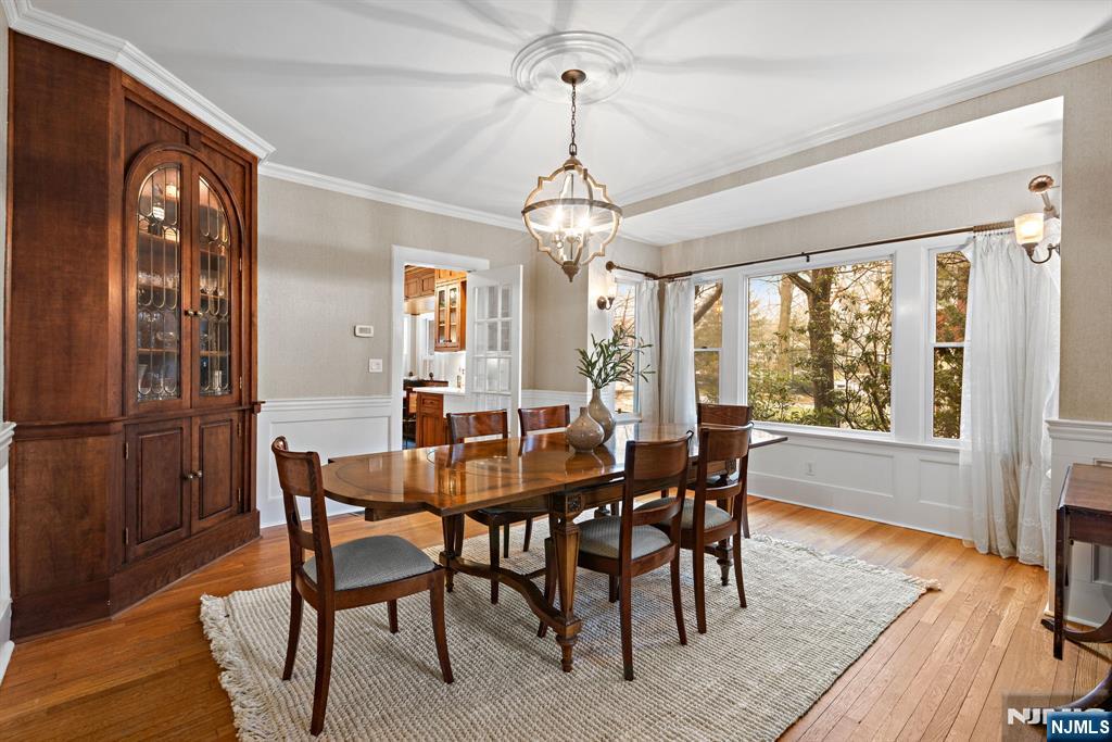 12 Midwood Road Glen Rock, NJ 07452 - Photo 8 of 30 a view of a dining room with furniture window and wooden floor
