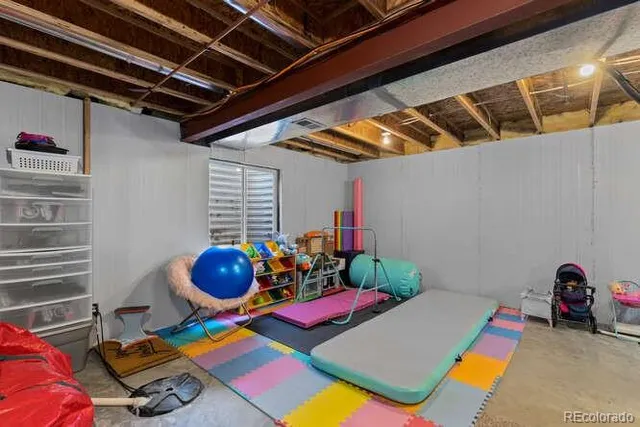 a room with furniture and a window